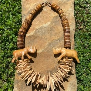 Unique hand carved Rhino wooden necklace.